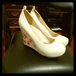 White and floral wedge shoes